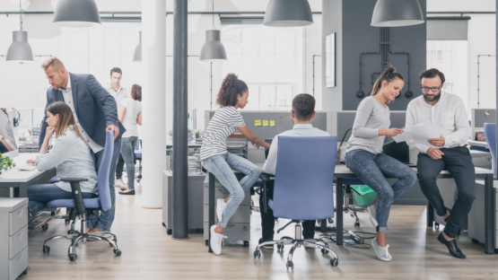 Startup-focused marketing team strategizing lead generation, content marketing, and conversion optimization in a modern workspace.